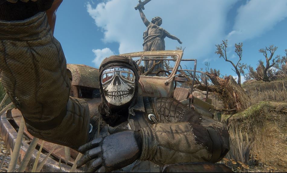 Character with skull face mask taking a selfie near old ruins