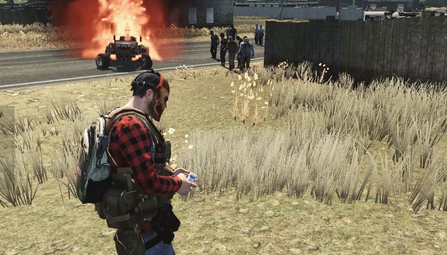 Player next to a vehicle that is on fire