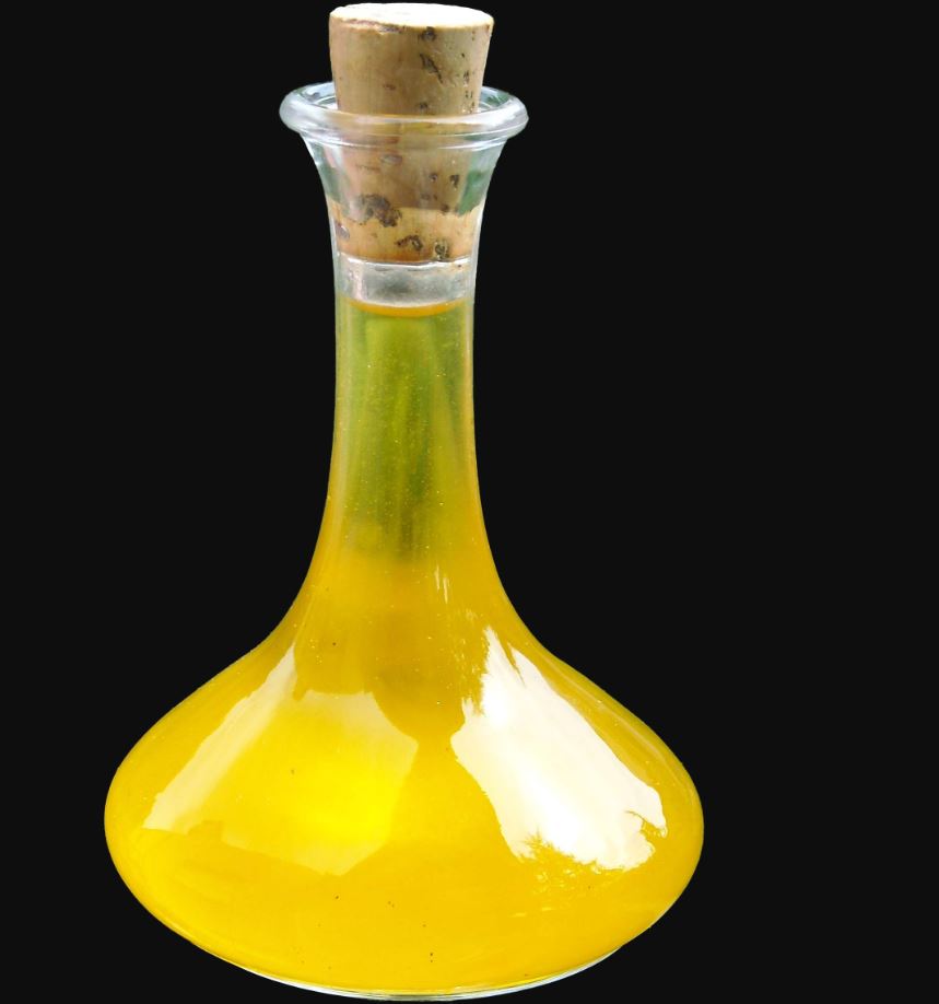 A freshly filled flask of oil [Photo Credit: Moringa Products]