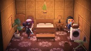 Reneigh in her home with a villager. 