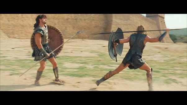 As depicted in Troy, two warriors fight fiercely with spears and shields.