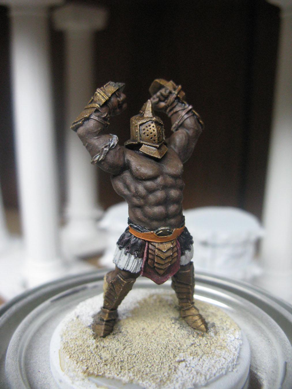 A miniature model shows the heavy metal and thick leather wrapped around the gladiator's arms, allowing him to deliver devastating punches.
