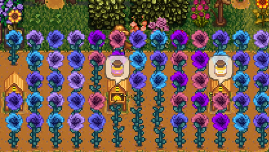 Fairy roses in blue, purple, pink, and lilac surround bee houses with honey