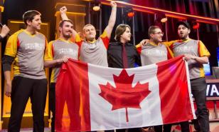 Rouge Et Au, from Laval University, celebrating their victory at Heroes of the Dorm