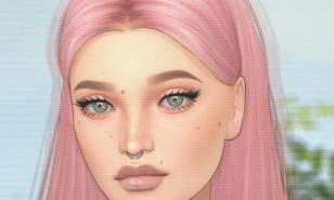 A girl with pink hair and pretty eyelashes.