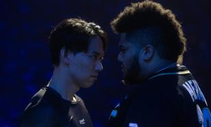 Tokido and MenaRD stare each other down before their big match at Evo 2023.