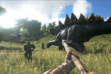 Player is trying to kill a dinosaur with a bow