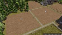 These empty crop fields are waiting for you to plant the first seeds on them.
