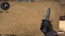 A blue, stealthy camouflage on an interesting knife!