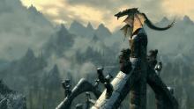 This image depicts a dragon sitting atop ruins in a snowy area of Skyrim