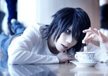 This cosplay shows how much L loves his sweets. 