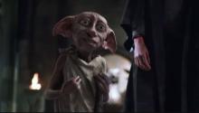Dobby becoming a free elf through the power of sock-giving