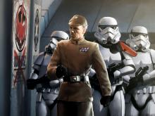 An officer leads stormtroopers on hunt of the insurgents