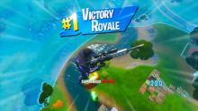 The victory royale screen appears after a win.