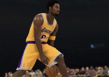Kobe Bryant dribbles between his legs.