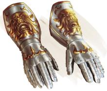 Giant silver gauntlets with ogre faces inscribed on either side