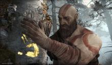 The game starts with Kratos cutting down a tree, witch tells you this game is not like the others.