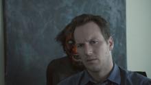 The red face demon behind Patrick Wilson.