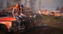 Max and Chloe hang out in a junkyard