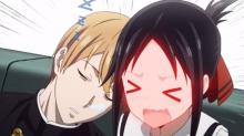 A sleep deprived Shirogane rests his head on a flustered Kaguya.