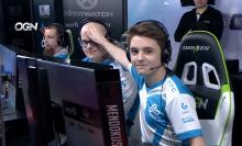 Mendo with his Cloud 9 team patting his pet teammate.