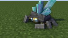 This little creature is a Grottol and is apart of the Mowzie's Mobs mod. He drops diamonds when killed!