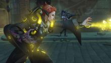 Moira utilizing her primary fire to heal