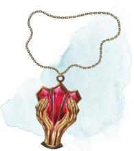 Gold and red necklace in the shape of two hands holding a heart