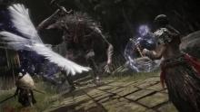 Players Fighting a Giant Enemy
