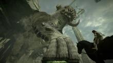Wanderer looking up at colossus: Shadow of the Colossus