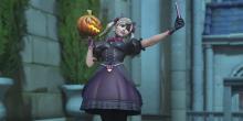 D.va taking a selfie with her pumpkin for Halloween.