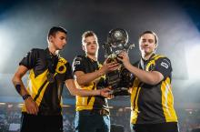 Previous RLCS Champions lifting the trophy.