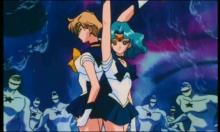 During one of the last stands Sailor Uranus and Sailor Neptune stand together during a vicious fight scene. Now that's a power couple, people should strive to be like these two.