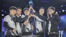 Doublelift (center-left) hoists the NA LCS trophy for his fourth time, this time with Team Liquid