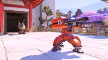 Torbjorn watching over his turret as it provides tracking fire