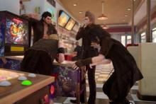 The boys hanging out as Noctis tries to beat the Justice Monsters V pinball game