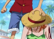 Luffy entrusts his hat to Nami