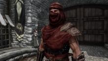 Wrapped in red cloth, their light armor is suited to the deserts of Hammerfell.