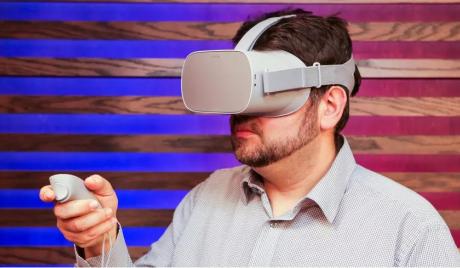 Man playing with the Oculus Go