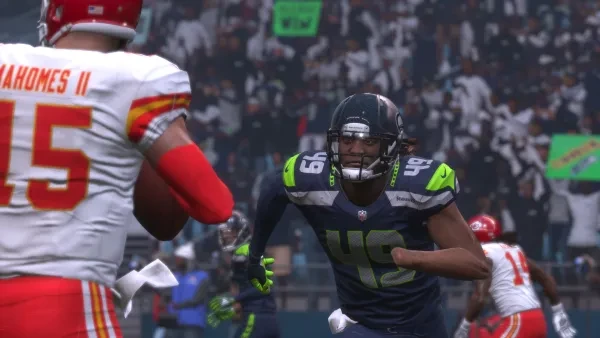 Shaquem Griffin Tacking Patrick Mahomes II. Shaquem Griffin (49) of Seattle going after Patrick Mahomes II of Kansas City. After the tackle, they might make dinner plans for each other.