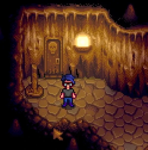 The dangers of Skull Cavern await beyond the door Character armed and ready to face Skull Cavern in Stardew Valley