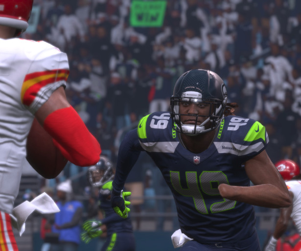 Shaquem Griffin (49) of Seattle going after Patrick Mahomes II of Kansas City. After the tackle, they might make dinner plans for each other. 