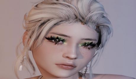 A female sim looking beautiful with custom content!