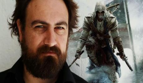 Director of Assassin's Creed, Justin Kurzel, atop a lovely Assassin's Creed backdrop.